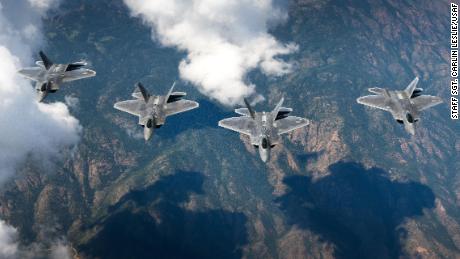 A four-ship formation of F-22 Raptors from the 94th Fighter Squadron and 1st Fighter Wing fly in formation over the Rocky Mountains in Colorado. The aircraft were in transit back to Joint Base Langley-Eustis, Va. after participating in Red Flag 17-4 Aug. 26, 2017. (U.S. Air Force photo/Staff Sgt. Carlin Leslie) 