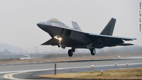 A US Air Force F-22 Raptor stealth jet takes off at a South Korean air base in Gwangju on December 4, 2017.