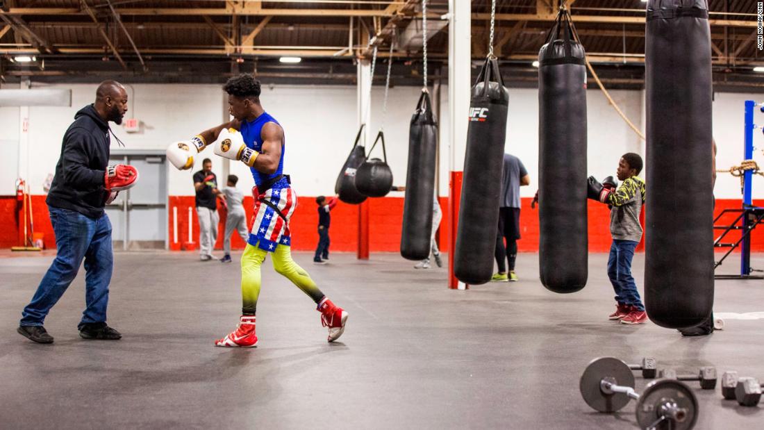 Sweeney has long had a passion for boxing, and he realized it could help young people develop discipline in other areas of life. What started as free lessons and mentoring, all paid out of his own pocket, is today a 27,000 square foot gym. It may look like a typical boxing gym at first glance, but the tutoring tables, computers and books give it away. Sweeney&#39;s motto is &quot;Books before boxing.&quot;