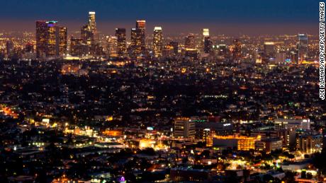 The Los Angeles skyline is seen during twilight on August 21, 2013 in California. AFP PHOTO /JOE KLAMAR (Photo credit should read JOE KLAMAR/AFP/Getty Images)