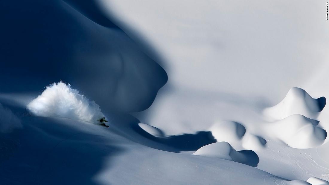 &lt;strong&gt;Shadow surfing:&lt;/strong&gt; &quot;This is one of my favorite pictures. I&#39;d been looking for this to line up for six years. I saw the shadow and asked snowboarder Yves Husler to hit it. He jumped into the turn and made a huge cloud. We had one chance and we had to try to nail it. I like the deep blue shadows and the contrasts with light and shade. This probably defines my style and is what I&#39;m looking for in a graphic, beautiful image.&quot; -- &lt;em&gt;Oskar Enander.&lt;/em&gt;&lt;br /&gt;