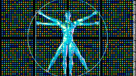 Genetic research. Computer artwork showing a DNA microarray and Leonardo da Vincis vitruvian man.