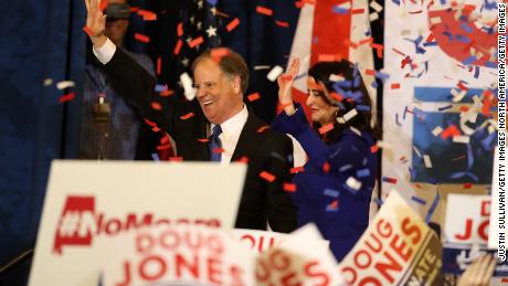 BIRMINGHAM, AL - DECEMBER 12:  Democratic U.S. Senator elect Doug Jones (L) and wife Louise Jones (R) greet supporters during his election night gathering the Sheraton Hotel on December 12, 2017 in Birmingham, Alabama.  Doug Jones defeated his republican challenger Roy Moore to claim Alabama&#39;s U.S. Senate seat that was vacated by attorney general Jeff Sessions. (Photo by Justin Sullivan/Getty Images)