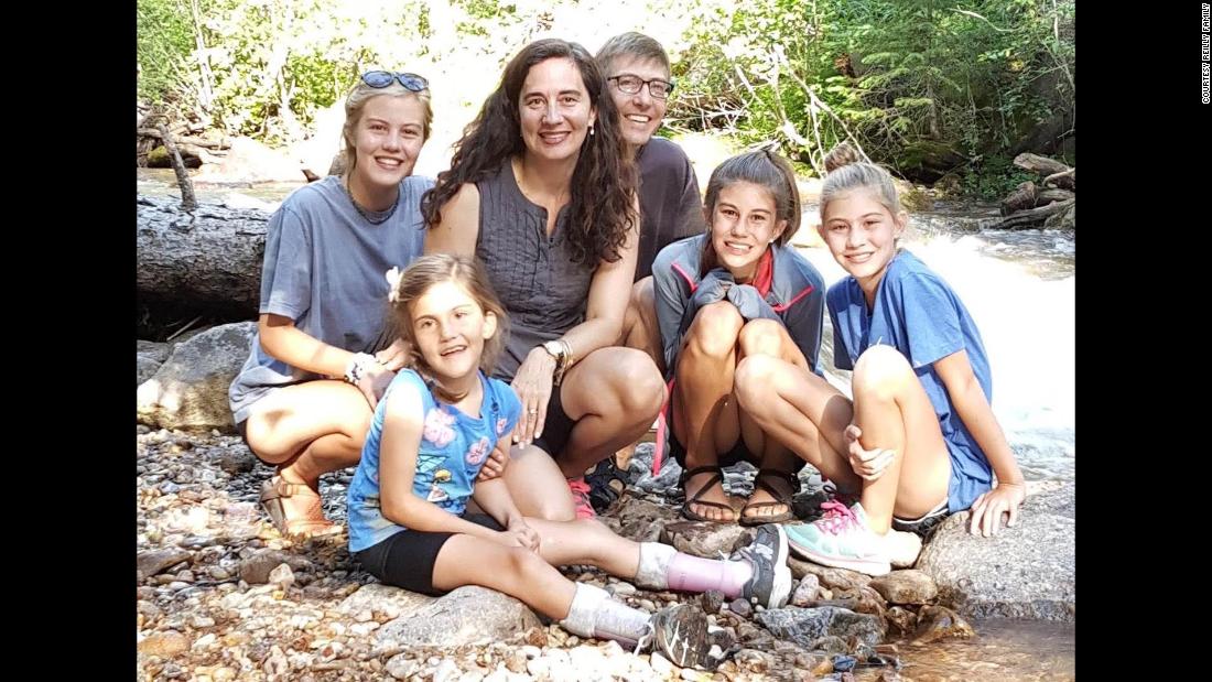 Avery Reilly, 10, bottom left, can&#39;t walk or talk because of a rare condition. But her family has helped her lead a fulfilling life. Every year, the Reilly family -- from left, Trinity, Avery, Helena, Brennan, Emory and Presley -- vacations near Cement Creek, Colorado. Avery loves to throw rocks in the water. 