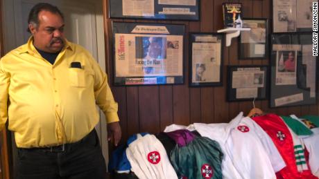 2017: Daryl Davis looks at his collection of KKK robes, given up by Klansmen he helped convert. 