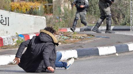 Israeli forces shoot at a Palestinian man after he allegedly stabbed a soldier in al-Bireh on Friday.