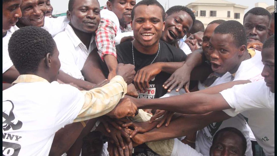 Lamboginny with some prisoners he helped to get released after a prison concert in Ikoyi Prison, Lagos in 2012.