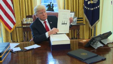 Trump signs sweeping tax overhaul