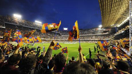 Barcelona fans cheer their team during the Copa del Rey against Real 