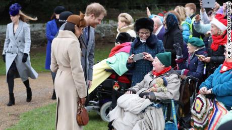 Meghan Markle and Prince Harry meet well-wishers outside the church.