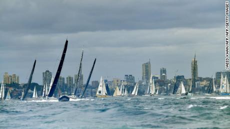 Yachts sail at the start of the Sydney to Hobart Yacht Race on Sydney Harbour on December 26, 2017. / AFP PHOTO / SAEED KHAN / --IMAGE RESTRICTED TO EDITORIAL USE - STRICTLY NO COMMERCIAL USE--        (Photo credit should read SAEED KHAN/AFP/Getty Images)