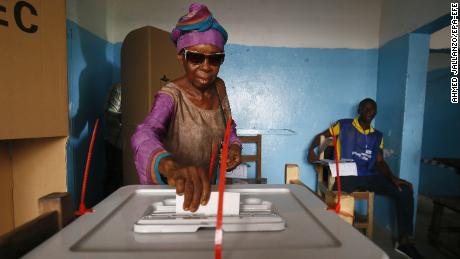 A voter casts her ballot in Monrovia, the capital of Libera.