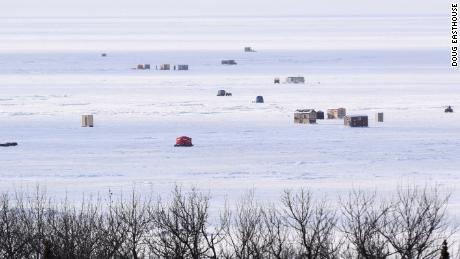 The cold weather spurred ice fishers to stake out spots on Upper Red Lake in Minnesota.