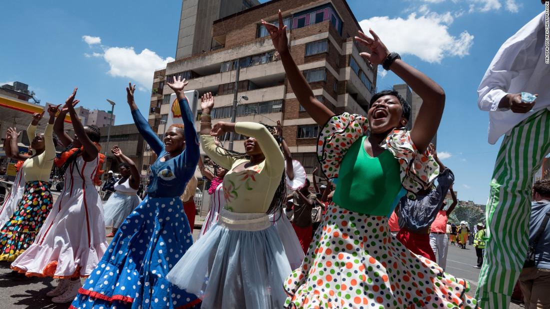 Performers parade through the streets as part of the annual Joburg Carnival in Johannesburg, South Africa. Many of the costumes are hand-made each year for the event.