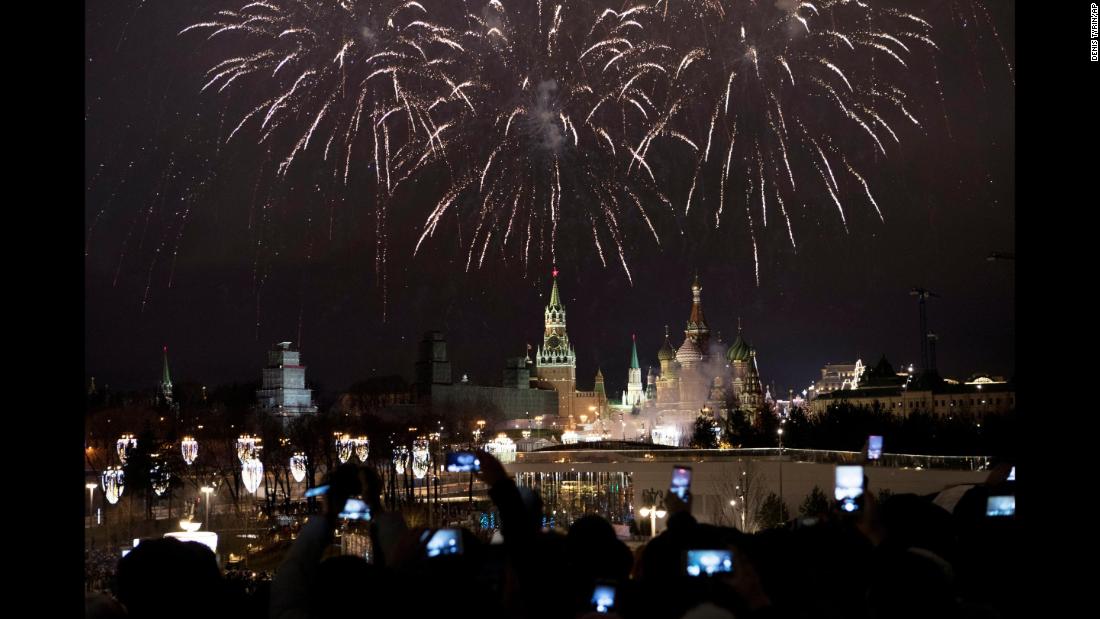 Fireworks explode over the Kremlin in Moscow.
