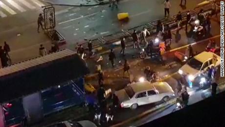 An image grab taken from a handout video released by Iran&#39;s Mehr News agency reportedly shows a group of men pushing traffic barriers in a street in Tehran on December 30, 2017.
Ten people died overnight in fresh unrest in Iran, local media reported on January 1, 2018, despite President Hassan Rouhani calling for calm and vowing more &quot;space for criticism&quot; in a bid to head off days of protest. / AFP PHOTO / MEHR NEWS / Handout / RESTRICTED TO EDITORIAL USE - MANDATORY CREDIT &quot;AFP PHOTO / HO / MEHR NEWS&quot; - NO MARKETING NO ADVERTISING CAMPAIGNS - DISTRIBUTED AS A SERVICE TO CLIENTS 
NO RESALE - NO BBC PERSIAN / NO VOA PERSIAN / NO MANOTO TVHANDOUT/AFP/Getty Images