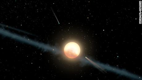 This illustration depicts a hypothetical uneven ring of dust orbiting KIC 8462852, also known as Boyajian's Star or Tabby's Star.