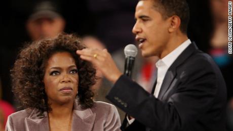 Oprah Winfrey with then-presidential candidate Barak Obama at a campaign rally with in 2007 in Des Moines, Iowa. 