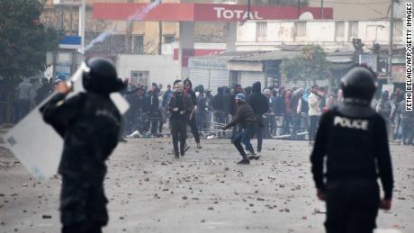 Tunisian protesters clash with security forces in the town of Tebourba on Tuesday.