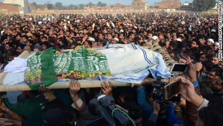 Crowds gather for funeral of Zainab in Kasur on Wednesday.