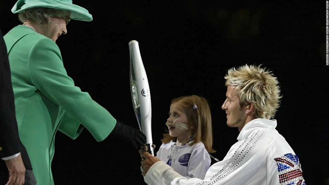 She was on hand to open the 2002 Games along with former England football captain David Beckham.