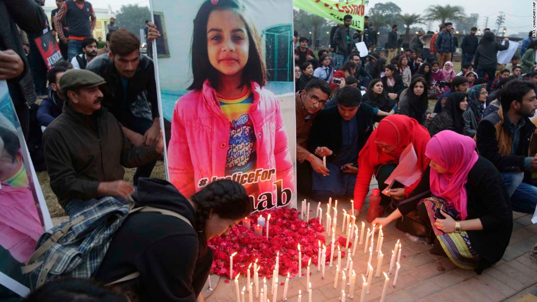 Pakistani students light candles during a protest rally to condemn the rape and killing of Zainab Ansari. 