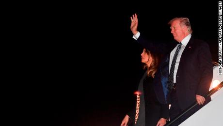 US President Donald Trump, and wife Melania step off Air Force One upon arrival at Palm Beach International Airport in West Palm Beach, Florida on January 12, 2018.
Trump is heading to Palm Beach, Florida where he is scheduled to spend the weekend at the Mar-a-Lago estate. / AFP PHOTO / Nicholas Kamm        (Photo credit should read NICHOLAS KAMM/AFP/Getty Images)