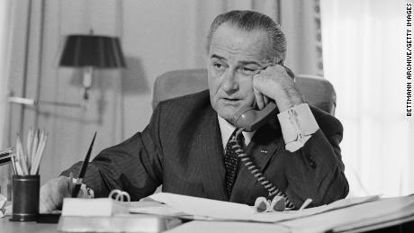 President Lyndon B. Johnson on the phone in the Oval Office in January 1968.