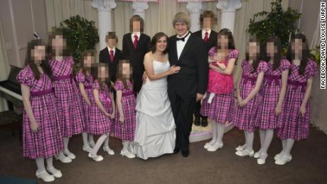 David and Louise Turpin pose with their children at one of the couple's vow renewals.