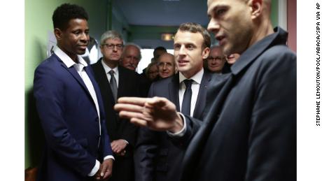 French President Emmanuel Macron during his visit to a migrant center in Croisilles, northern France.