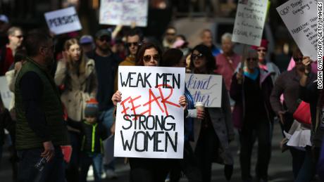 A protester takes part in a women&#39;s rights rally in Charlotte, North Carolina, on January 20, 2018.