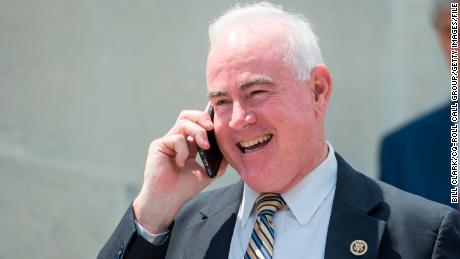 UNITED STATES - MAY 25: Rep. Pat Meehan, R-Pa., talks on his phone as he walks down the House steps following votes in the Capitol on Wednesday, May 25, 2016. (Photo By Bill Clark/CQ Roll Call)