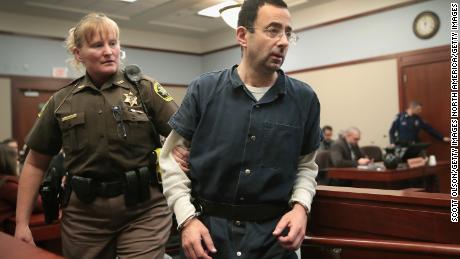 LANSING, MI - JANUARY 17: Larry Nassar appears in court to listen to victim impact statements during his sentencing hearing after being accused of molesting more than 100 girls while he was a physician for USA Gymnastics and Michigan State University where he had his sports-medicine practice on January 17, 2018 in Lansing, Michigan. Nassar has pleaded guilty in Ingham County, Michigan, to sexually assaulting seven girls, but the judge is allowing all his accusers to speak. Nassar is currently serving a 60-year sentence in federal prison for possession of child pornography. (Photo by Scott Olson/Getty Images)