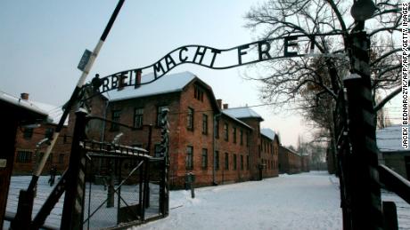 This picture taken on December 18, 2009 shows a replica hung in place of the stolen infamous &quot;Arbeit macht frei&quot; sign at the former Nazi death camp Auschwitz in Oswiecim, Poland.  The theft of the infamous &quot;Arbeit macht frei&quot; sign at the Nazi German-era Auschwitz death camp in Poland sparked outrage on December 18, 2009, as police launched a hunt for the perpetrators. &quot;The inscription was stolen early this morning,&quot; Auschwitz-Birkenau Museum spokesman Jaroslaw Mensfelt told AFP, adding that the thieves must have known what they were doing.  AFP PHOTO/PAP/JACEK BEDNARCZYK - POLAND OUT - (Photo credit should read JACEK BEDNARCZYK/AFP/Getty Images)