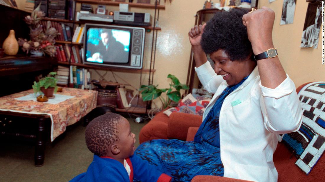 Madikizela-Mandela is pictured with her grandson in 1986.