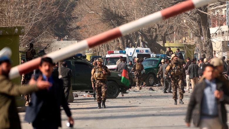 Security forces inspect the site of Saturday's attack in the center of the Afghan capital.