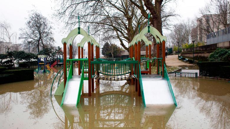A children's playground in Paris is flooded alongside the Seine on Saturday.