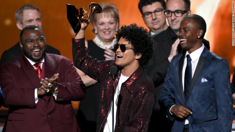 Bruno Mars accepts the Grammy Award for album of the year, which he won for &quot;24K Magic&quot; on Sunday, January 28. Mars also won the Grammys for song of the year (&quot;That&#39;s What I Like&quot;) and record of the year (&quot;24K Magic&quot;).
