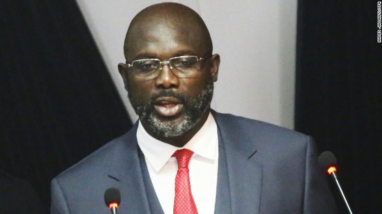 Liberian President George Weah cuts salary to confront 'broken economy'