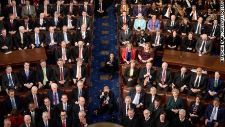 Cabinet members, members of Congress and Supreme Court justices listen as President Donald Trump delivers the State of the Union address on January 30, 2018.
