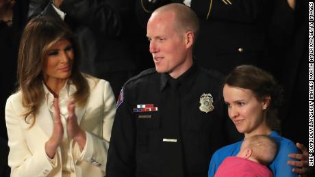 WASHINGTON, DC - JANUARY 30:  First lady Melania Trump claps for Police officer Ryan Holets and his wife during the State of the Union address in the chamber of the U.S. House of Representatives January 30, 2018 in Washington, DC. This is the first State of the Union address given by U.S. President Donald Trump and his second joint-session address to Congress.  (Photo by Chip Somodevilla/Getty Images)
