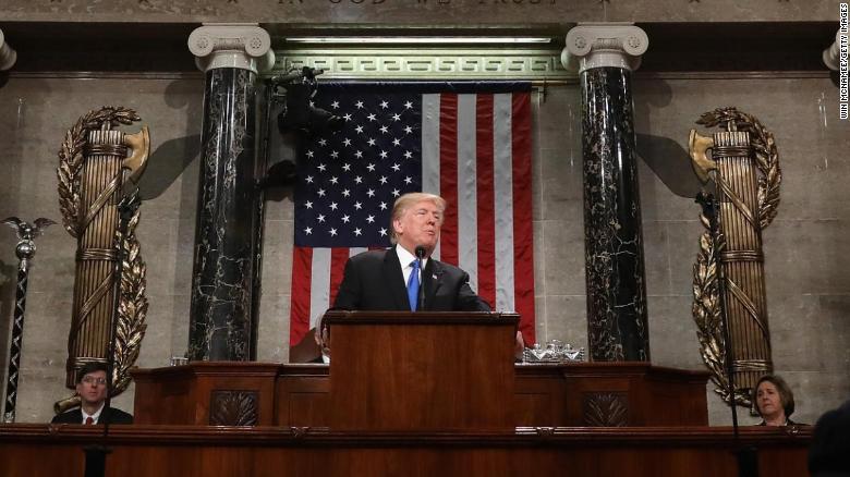WASHINGTON, DC - JANUARY 30: U.S. President Donald J. Trump waves during the State of the Union address as U.S. Vice President Mike Pence (L) and Speaker of the House U.S. Rep. Paul Ryan (R-WI) (R) look on in the chamber of the U.S. House of Representatives January 30, 2018 in Washington, DC. This is the first State of the Union address given by U.S. President Donald Trump and his second joint-session address to Congress. (Photo by Win McNamee/Getty Images)