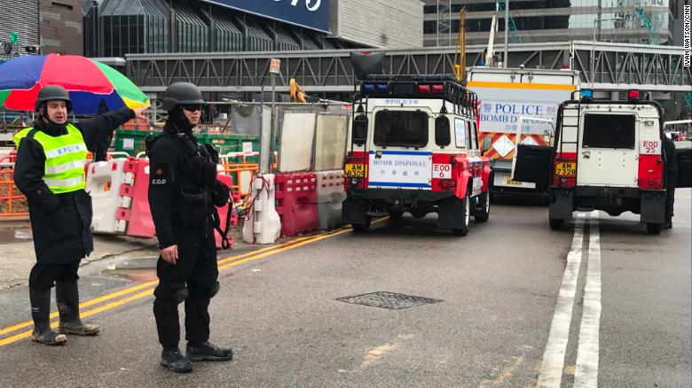 Police are present Wednesday outside the Hong Kong construction site where the explosive was found. 
