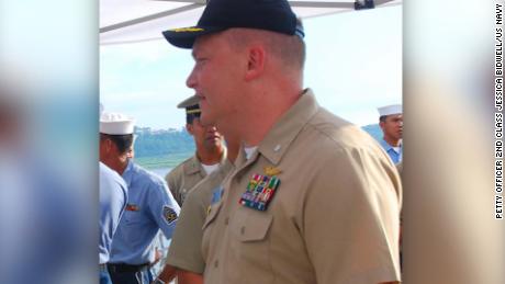 Cmdr. Troy Amundson, right, speaks with members of the Philippine navy before a closing ceremony for Cooperation Afloat Readiness and Training aboard the guided-missile destroyer USS Halsey. CARAT is a series of bilateral exercises held annually in Southeast Asia to strengthen relationships and promote maritime security.