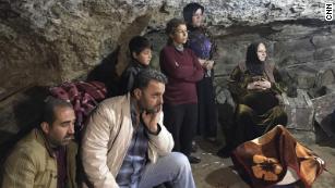 &#39;This is a massacre&#39;: Turkey&#39;s bombs drive families into caves