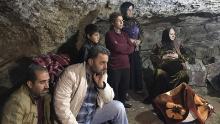 Turkish bombs drive families into caves