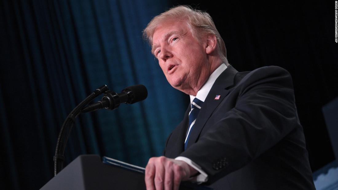 Trump signs sex assault bill as scandal engulfs White House