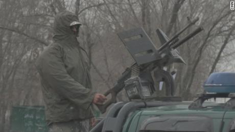 A gunman mans a checkpoint in Afghanistan's capital of Kabul. 