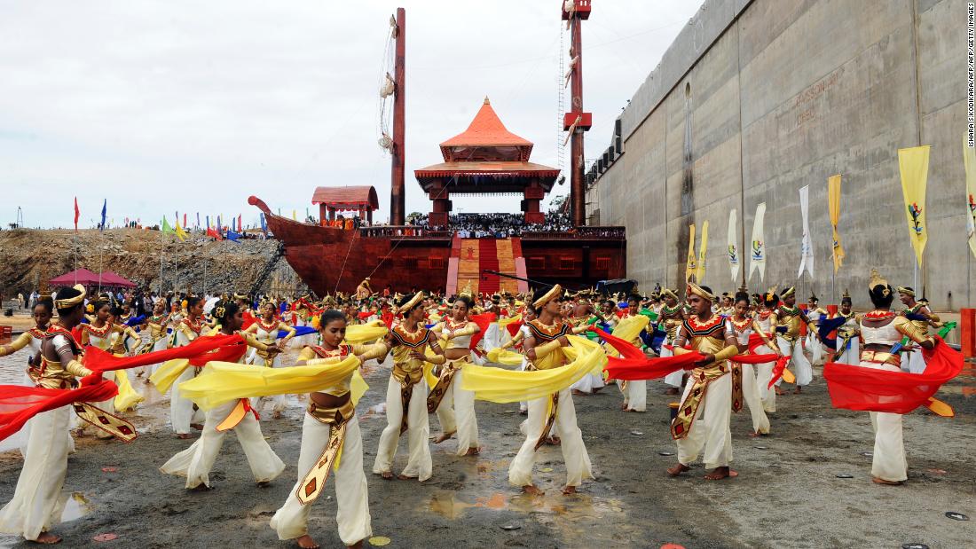 Sri Lankan dancers perform at the site of the Hambantota port during a ceremony marking the first phase of construction, August 15, 2010. 