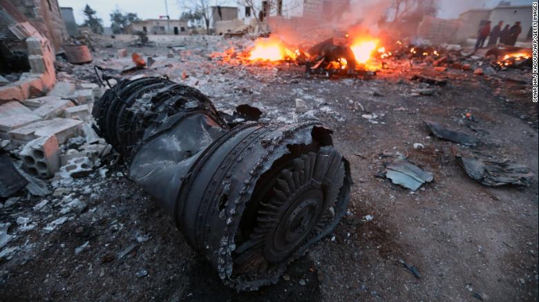 Smoke billows from the site of the downed Russian plane Saturday in the northwest province of Idlib.